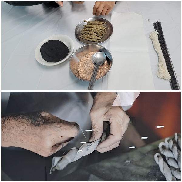 뽕나무로 만든 숯, 말린 쑥, 소금을 한지에 싸서 꽈배기 모양으로 꼬아 낙화봉을 만든다. 사진=김현철 기자